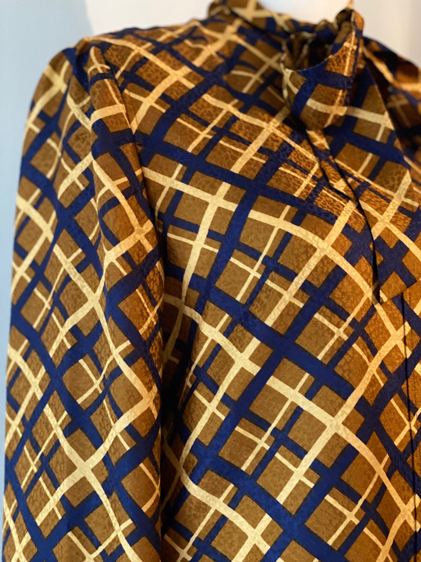 Saint Laurent geometric silk pussy bow blouse.