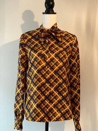 Saint Laurent geometric silk pussy bow blouse.