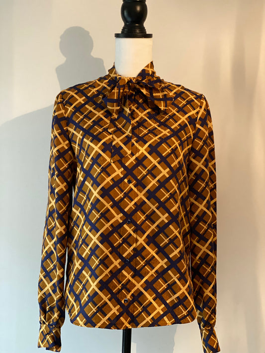 Saint Laurent geometric silk pussy bow blouse.